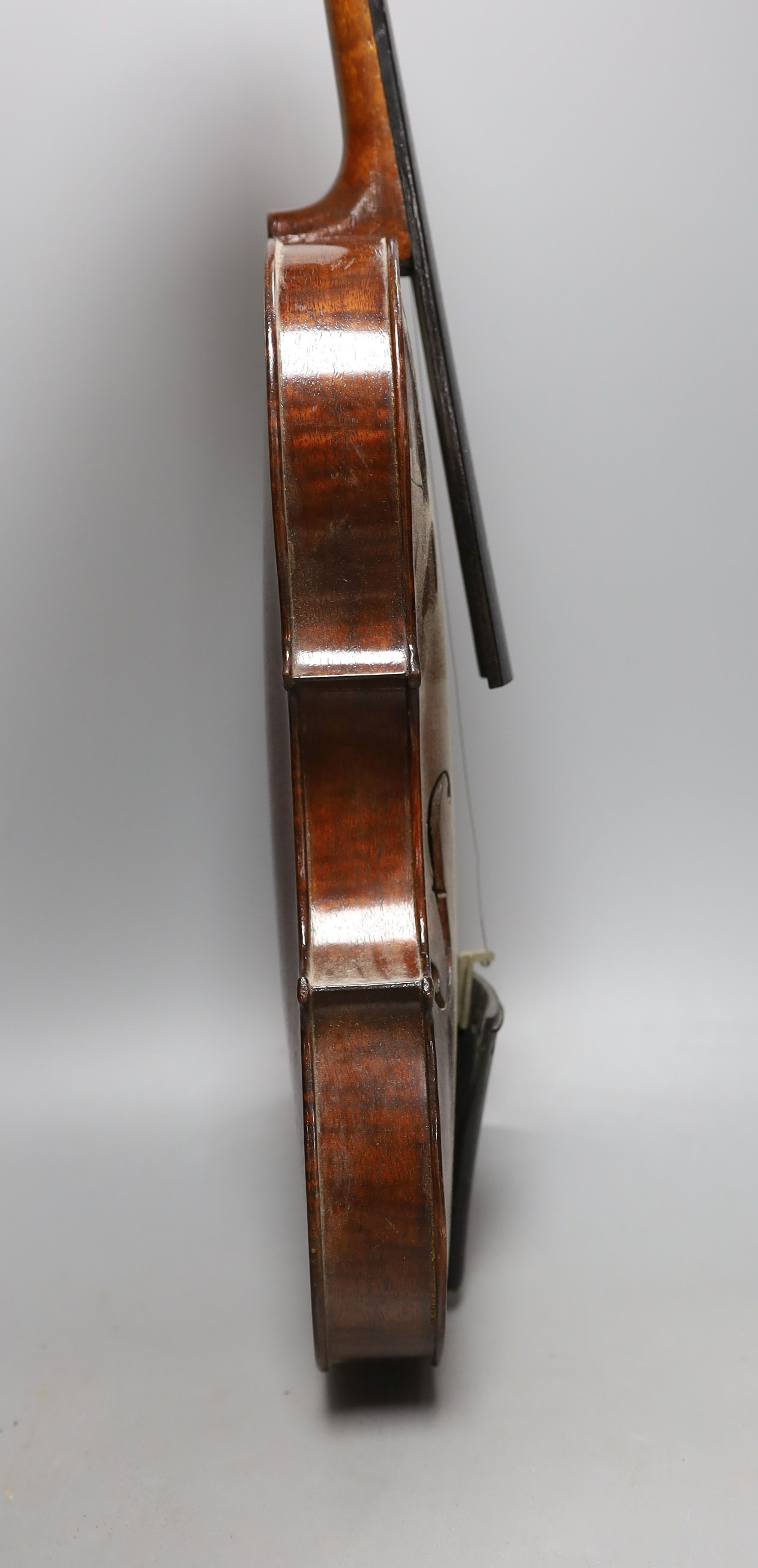 A cased 19th century violin